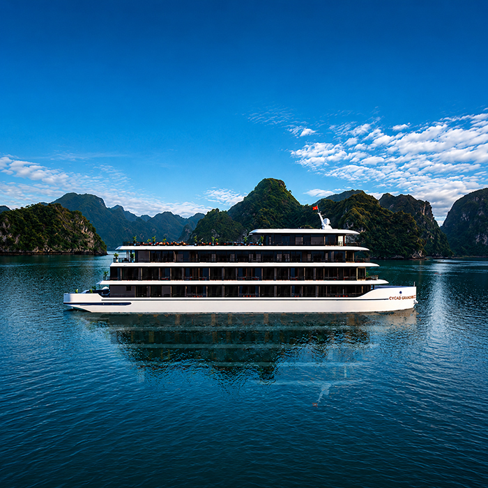 Modern white Cycad Grand Cruise ship sailing in the bay